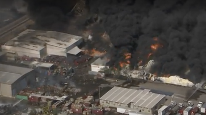 VIDEO: More than 200 firefighters battle massive recycling yard fire in Arizona