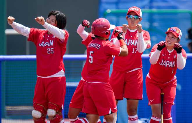 Download Let the Games begin: Japan tops Australia in softball as ...